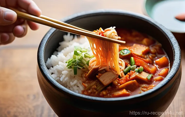 김치찌개 만드는 동영상 추천 - **Prompt 1: Cozy Evening Kimchi Jjigae**
    A close-up shot of a steaming, vibrant red Kimchi Jjiga...